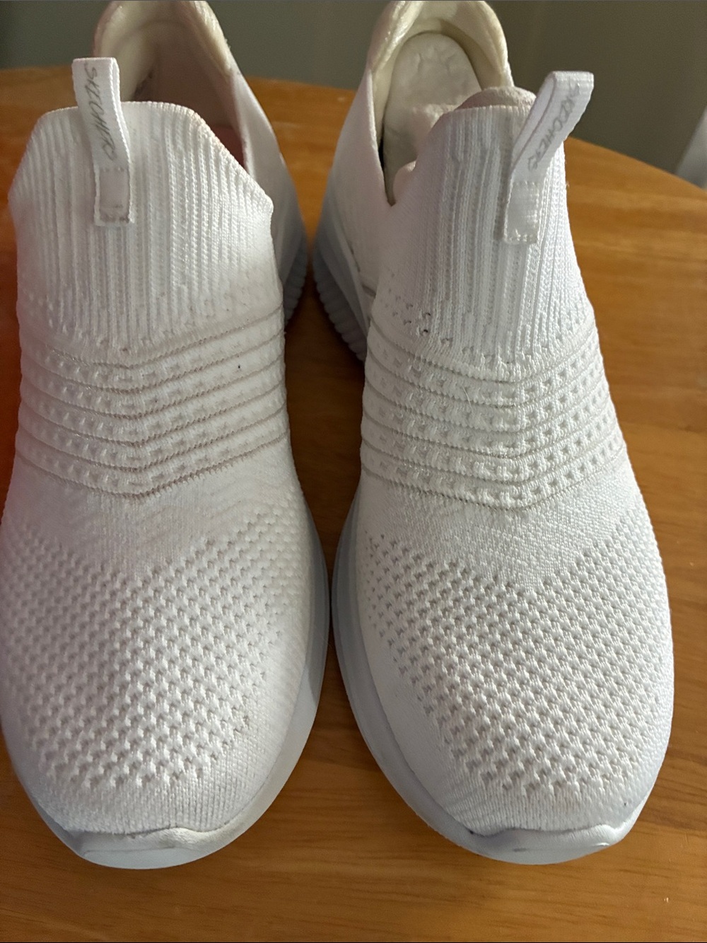Skechers Women's White Slip-On Knit Sneakers